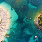 Ksamil, Albania, Corfu, Greece, Ionian Sea, things to do, 5 things to do in ksamil, Ksamil Beach, Big Ksamil Beach,Turtle Beach, european Bali, Butrint, Ali Pasha Castle, Ali Pasha, Castle, culture of Albania, Buthrotum, local food, Ksamil beaches, Ksamil Albania, Ksamil hotels, Ksamil attractions, Ksamil things to do, Ksamil travel guide, Ksamil restaurants, Ksamil weather, Ksamil nightlife, Ksamil accommodation, Ksamil islands, Ksamil beach resorts, Ksamil vacation, Ksamil tours, Ksamil camping, Ksamil photos, Ksamil travel tips, Ksamil transport, Ksamil best time to visit, Ksamil holiday, best places to visit, Ksamil, Albanija, Krf, Grčka, Jonsko more, 5 stvari koje treba vidjeti, plaža Ksamil, plaža Big Ksamil, plaža kornjača, europski Bali, Butrint, dvorac Ali Pasha, Ali Pasha, dvorac, kultura Albanije, Butthrotum, lokalna hrana, Ksamil plaže, Ksamil Albanija, Ksamil hoteli, Ksamil atrakcije, Ksamil aktivnosti, Ksamil turistički vodič, Ksamil restorani, Ksamil vrijeme, Ksamil noćni život, Ksamil smještaj, Ksamil otoci, Ksamil plaža odmarališta, Ksamil odmor, Ksamil ture , Ksamil kampiranje, Ksamil fotografije, Ksamil putni savjeti, Ksamil prijevoz, Ksamil najbolje vrijeme za posjetiti, Ksamil odmor, najpovoljnija destinacija za ljetovanje, što vidjeti u albaniji, što vidjeti u ksamilu, što raditi u