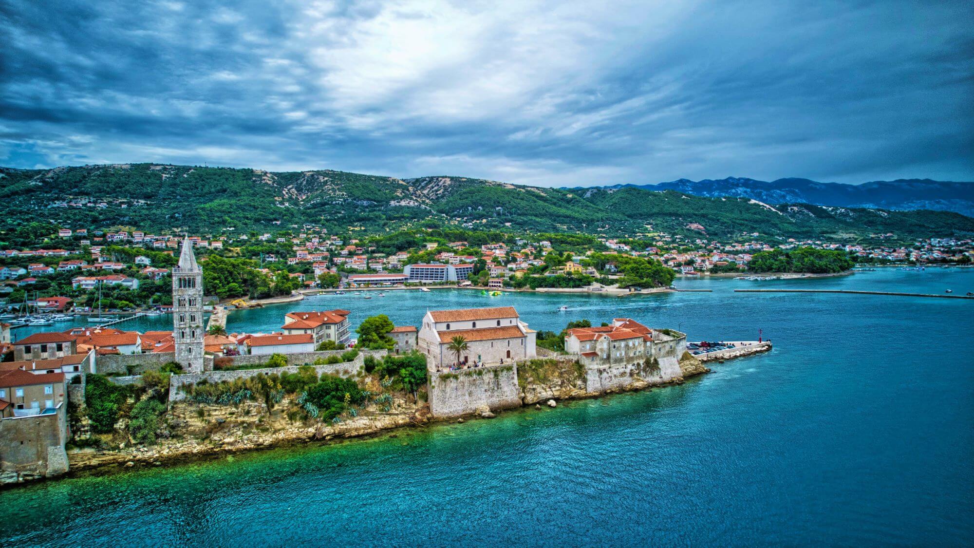 sandy beaches, Rab, Island of Rab, Rab island, Adriatic Sea, pearl of the Adriatic, Pag island, Cres island, island Krk, attractions Rab, Rab attractions, Old town Rab, St. Christopher, fort rab, church of St. Christopher, church St. Christopher, main square rab, Lopar beach, Suha Punta beach, Pudarica beach, rab cuisine, Rab cake, marasca, rab activities, rab monty beach, dog beach rab, Rabska fjera festival, Rab fjera festival,Goli otok, Goli island, rab festivals, rab food, rab beaches, rab old town, pješčane plaže, Rab, Otok Rab, otok Rab, Jadransko more, biser Jadrana, otok Pag, otok Cres, otok Krk, znamenitosti Rab, Rab znamenitosti, Stari grad Rab, Sveti Kristofor, utvrda rab, crkva sv. Kristofora, crkva sv. Kristofora, glavni trg rab, plaža Lopar, plaža Suha Punta, plaža Pudarica, rapska kuhinja, rapska torta, maraska, rapske aktivnosti, plaža rab monty, plaža za pse rab, festival rapske fjere, festival rapske fjere, Goli otok , Goli otok, rapske fešte, rapska hrana, 
