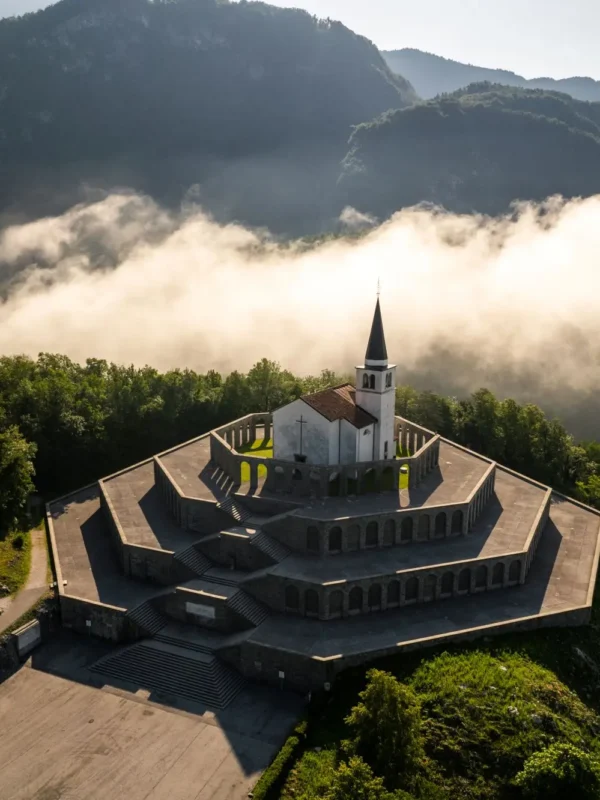 underrated places in Slovenia, Kobarid, Kobarid village, Slovenia, Julian Alps, Kobarid Museum, Soča River, Kobarid, Julian Alps, hiking Julian Alps, underrated place to visit in Slovenia, place to visit in Slovenia, Italian ossuary, Italian Charnel house, Church of St. Anthony, Waterfall Kozjak, Napoleon's bridge, Tonovec castle, things to see in Kobarid podcijenjena mjesta u Sloveniji, Kobarid, selo Kobarid, Slovenija, Julijske Alpe, Muzej Kobarid, rijeka Soča, Kabarid, Julijske Alpe, planinarenje Julijske Alpe, podcijenjeno mjesto za posjetiti u Sloveniji, mjesto za posjetiti u Sloveniji, talijanska kosturnica, talijanska kosturnica, Crkva sv. Ante, slap Kozjak, Napoleonov most, dvorac Tonovec, što vidjeti u Kobaridu