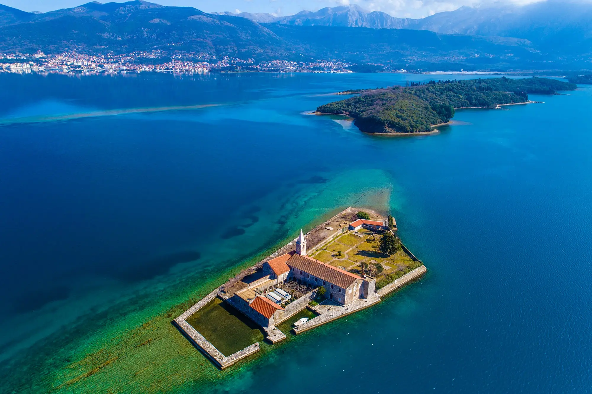 Our Lady of the Rocks, Tivat Bay, Our Lady of Mercy, Our Lady of Mercy island, island Our Lady of Mercy, Krtol archipelago, Island of Flowers, Island of Sveti Marko, Stradioti, Our Lady of Mercy,  Franciscan monastery Tivat, Boka Kotor, Boka Kotor islands, Boka Kotor islets,Tivat Saltern, things to do in tivat, things to do in boka kotor bay, kotor bay attractions, tivat bay attractions, boat trips kotor, Gospa od Škrpjela, Tivatski zaljev, Gospa od Milosti, Otok Gospe od Milosti, otok Gospe od Milosti, Krtolski arhipelag, Otok cvijeća, Otok Sveti Marko, Stradioti, Gospa od Milosti, Franjevački samostan Tivat, Boka Kotor, Bokokotorski otoci, Bokokotorski otočići, Tivatska solana, aktivnosti u Tivtu, aktivnosti u Bokokotorskom zalivu, atrakcije Kotorskog zaliva, atrakcije Tivatskog zaliva, izleti brodom kotor, ostrvo gospa od milosti