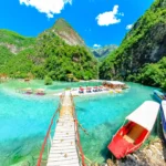 Albania, the newest popular destination, Ksamil, Sarande, Dhermi, Gjirokaster, Kruja, Shale River, Shala River Canyon, Komani Lake, Shala river boat ride, shall river canyon boat ride, Komani Dam, Komani Lake ferry stop, Shala islands, Shala River Albania, Valbona-Shala National Park, Theth to Shala River, Shala River boat tour, Shala River attractions, Shala River camping, Shala River waterfalls, Shala River hiking, Shala River photography, Valbona Valley, Albanian Alps, Shala River scenic views, Best time to visit Shala River, Shala River accommodation, shala river hike, shala river canyon hike,shala river canyon tours, shala river canyon swimming, shala river hotel, how to get to shala river,  Albanija, najnovije popularno odredište, Ksamil, Sarande, Dhermi, Gjirokaster, Kruja, rijeka Shale, rijeka Shala, kanjon rijeke Shala, jezero Komani, vožnja brodom po rijeci Shala, vožnja brodom po kanjonu rijeke Shall, brana Komani, trajektna stanica na jezeru Komani, otoci Shala, Shala Rijeka Albanija, Nacionalni park Valbona-Shala, Theth do rijeke Shala, obilazak brodom rijeke Shala, atrakcije rijeke Shala, kampiranje na rijeci Shala, slapovi rijeke Shala, planinarenje rijekom Shala, fotografija rijeke Shala, dolina Valbona, Albanske Alpe, slikoviti pogledi rijeke Shala, Najbolje vrijeme za posjetiti rijeku Shala, smještaj na rijeci Shala, planinarenje rijekom Shala, planinarenje kanjonom rijeke Shala, obilasci kanjona rijeke Shala, plivanje u kanjonu rijeke Shala, hotel na rijeci Shala, kako doći do rijeke Shala, popularna odredišta, ​