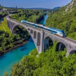 Solkan Bridge, Solkan Bridge Slovenia, Longest stone arch bridge, Soča River bridge, Bohinj Railway landmark, Tourist attraction Solkan, Historical bridge Solkan, Engineering marvel Solkan, World War I bridge Solkan, Sightseeing in Vipava Valley, Solkan Railway Bridge, Solkan Viaduct, Solkan Bridge history, Solkan Bridge architecture, Solkan Bridge tourist spot, Solkan Bridge travel destination, Solkan Bridge landmark, Solkan Bridge photography, Solkan Bridge sightseeing, Solkan Bridge visitor information, Solkan Bridge travel guide, Solkan Bridge fun facts, Solkan Bridge architecture style, Solkan Bridge train route, Solkan Bridge crossing, Solkan Bridge viewpoint, Solkan Bridge scenic spot, Solkan Bridge travel tips, Solkan Bridge nearby attractions, Solkan Bridge photos, Soča River, Solkan, Vipava Valley, Leopold Örley, Rudolf Jaussner, Bohinj Railway, Gorica, Jesenice,Solkan Bridge wikipedia, Solkan Bridge history, Solkan Bridge height, Solkan Bridge facts, longest stone bridge in europe, world's longest stone bridge, world's longest arched stone railway bridge, Solkanski most, Solkanski most Slovenija, Najduži kameni lučni most, Most na Soči, Bohinjska željeznica, Turistička atrakcija Solkan, Povijesni most Solkan, Inženjersko čudo Solkan, Most iz Prvog svjetskog rata Solkan, Razgledavanje Vipavske doline, Solkanski željeznički most, Solkanski vijadukt, Povijest Solkanskog mosta, arhitektura Solkanskog mosta, turističko mjesto Solkanskog mosta, turistička destinacija Solkanskog mosta, Znamenitost Solkanskog mosta, Fotografija Solkanskog mosta, Razgledavanje Solkanskog mosta, Informacije za posjetitelje Solkanskog mosta, Turistički vodič za Solkanski most, Zabavne činjenice o Solkanskom mostu, Stil arhitekture Solkanskog mosta, Ruta vlaka Solkanskog mosta, Prijelaz Solkanskog mosta, Vidikovac Solkanskog mosta, Slikovita točka Solkanskog mosta, Solkanski most putnički savjeti, Solkanski most obližnje atrakcije, Fotografije Solkanskog mosta, Rijeka Soča, Solkan, Vipavska dolina, Leopold Örley, Rudolf Jaussner, Bohinjska željeznica, Gorica , Jesenice,Solkanski most wikipedia, Solkanski most povijest, Solkanski most visina, Solkanski most činjenice, najduži kameni most u Europi, Najduži kameni most na svijetu, Najduži lučni kameni željeznički most na svijetu,
