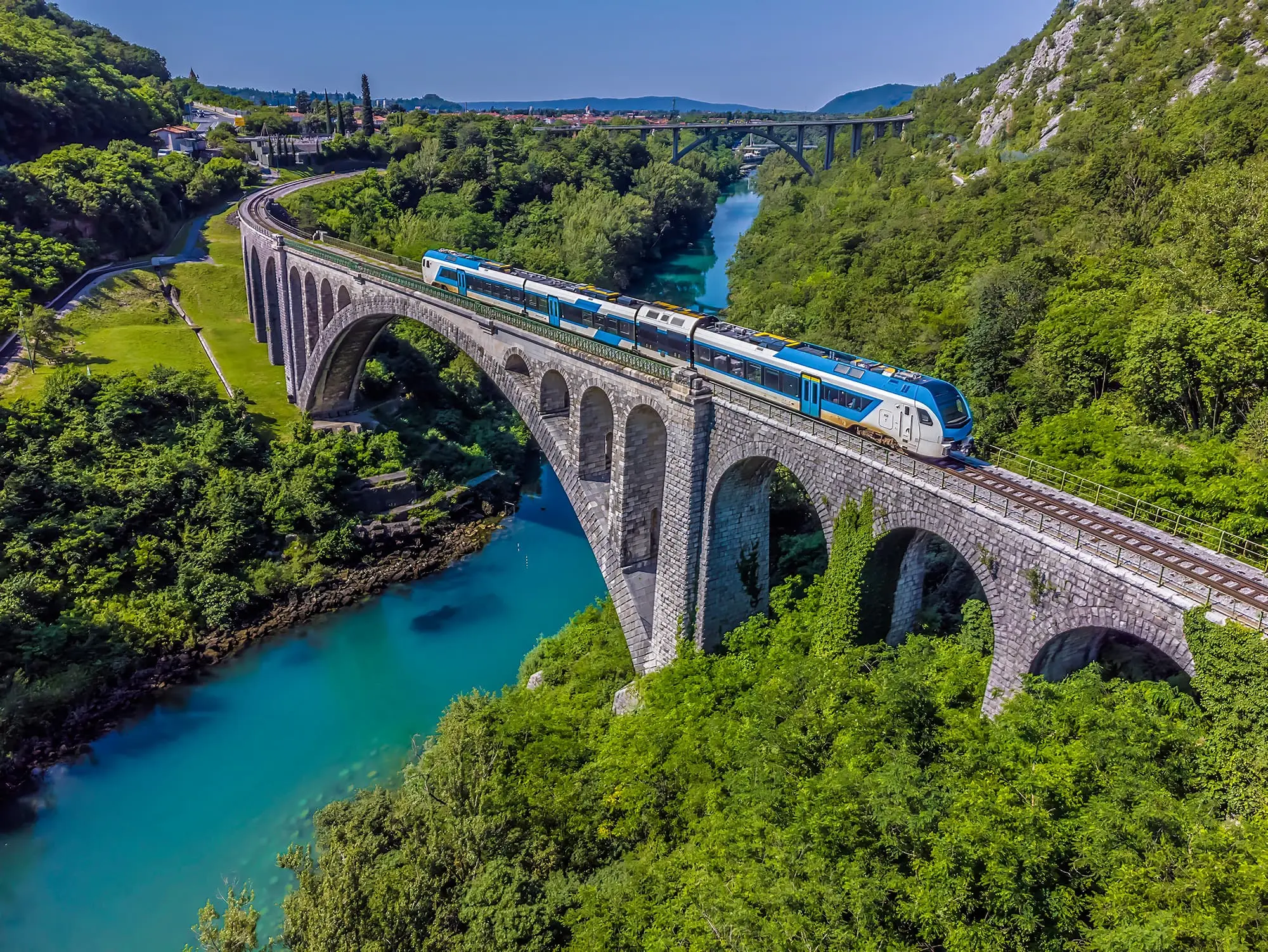 Solkan Bridge, Solkan Bridge Slovenia, Longest stone arch bridge, Soča River bridge, Bohinj Railway landmark, Tourist attraction Solkan, Historical bridge Solkan, Engineering marvel Solkan, World War I bridge Solkan, Sightseeing in Vipava Valley, Solkan Railway Bridge, Solkan Viaduct, Solkan Bridge history, Solkan Bridge architecture, Solkan Bridge tourist spot, Solkan Bridge travel destination, Solkan Bridge landmark, Solkan Bridge photography, Solkan Bridge sightseeing, Solkan Bridge visitor information, Solkan Bridge travel guide, Solkan Bridge fun facts, Solkan Bridge architecture style, Solkan Bridge train route, Solkan Bridge crossing, Solkan Bridge viewpoint, Solkan Bridge scenic spot, Solkan Bridge travel tips, Solkan Bridge nearby attractions, Solkan Bridge photos, Soča River, Solkan, Vipava Valley, Leopold Örley, Rudolf Jaussner, Bohinj Railway, Gorica, Jesenice,Solkan Bridge wikipedia, Solkan Bridge history, Solkan Bridge height, Solkan Bridge facts, longest stone bridge in europe, world's longest stone bridge, world's longest arched stone railway bridge, Solkanski most, Solkanski most Slovenija, Najduži kameni lučni most, Most na Soči, Bohinjska željeznica, Turistička atrakcija Solkan, Povijesni most Solkan, Inženjersko čudo Solkan, Most iz Prvog svjetskog rata Solkan, Razgledavanje Vipavske doline, Solkanski željeznički most, Solkanski vijadukt, Povijest Solkanskog mosta, arhitektura Solkanskog mosta, turističko mjesto Solkanskog mosta, turistička destinacija Solkanskog mosta, Znamenitost Solkanskog mosta, Fotografija Solkanskog mosta, Razgledavanje Solkanskog mosta, Informacije za posjetitelje Solkanskog mosta, Turistički vodič za Solkanski most, Zabavne činjenice o Solkanskom mostu, Stil arhitekture Solkanskog mosta, Ruta vlaka Solkanskog mosta, Prijelaz Solkanskog mosta, Vidikovac Solkanskog mosta, Slikovita točka Solkanskog mosta, Solkanski most putnički savjeti, Solkanski most obližnje atrakcije, Fotografije Solkanskog mosta, Rijeka Soča, Solkan, Vipavska dolina, Leopold Örley, Rudolf Jaussner, Bohinjska željeznica, Gorica , Jesenice,Solkanski most wikipedia, Solkanski most povijest, Solkanski most visina, Solkanski most činjenice, najduži kameni most u Europi, Najduži kameni most na svijetu, Najduži lučni kameni željeznički most na svijetu,