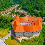 Slovenija, Slovenija dvorci, dvorci u Sloveniji, Brestanica, dvorac Rajhenburg, dvorac Rajhenburg povijest, dvorac Rajhenburg wikipedia,  imperial čokolada, Rajhenburg čokolada, prva čokolada u sloveniji, logor za deportaciju Slovenaca, dvorac Rajhenburg logor, logor slovenija,  Kazneno-popravni dom za žene, Primož  Kozmus, sir trapist, zašto se sir trapist tako zove, Slovenia, Slovenia castles, castles in Slovenia, Brestanica, Rajhenburg castle, Rajhenburg castle history, Rajhenburg castle wikipedia, imperial chocolate, Rajhenburg chocolate, the first chocolate in Slovenia, camp for the deportation of Slovenians, Rajhenburg castle camp, camp Slovenia, Correctional center for women, Primož Kozmus, Trappist cheese, why is Trappist cheese called that,