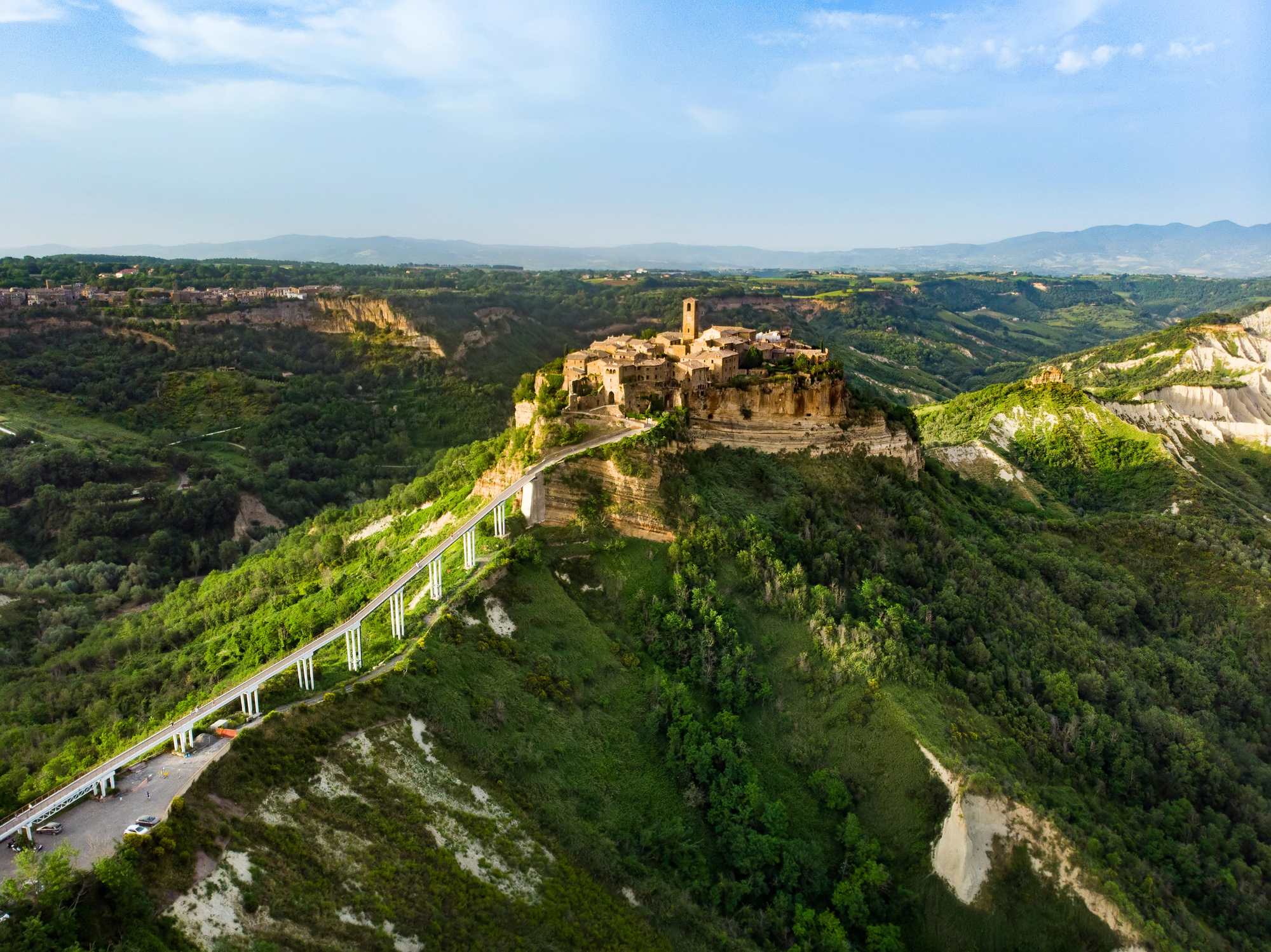 Civita di Bagnoregio, grad koji umire, Civita Italija, putovanje u Civita di Bagnoregio, što vidjeti u Civita di Bagnoregio, kako doći do Civita di Bagnoregio, ulaznice Civita di Bagnoregio, povijest Civita di Bagnoregio, Valle dei Calanchi, dolina Calanchi, Lazia, Piazza San Donato, Crkva svetog Donata, Muzej geologije i klizišta, palača Alemanni, špilja svetog Bonaventure, špilja San Bonaventure, Belvedere, Porta Santa Maria, Porta Santa Maria Civita, Piazza San Donato Civita, Belvedere Civita di Bagnoregio, mačke Civite, most Civita di Bagnoregio, atrakcije Civita di Bagnoregio, relikvijar svetog Bonaventure, turizam u Civita di Bagnoregio, francuski relikvijar Civita, Civita di Bagnoregio, the dying city, Civita Italy, travel to Civita di Bagnoregio, what to see in Civita di Bagnoregio, how to get to Civita di Bagnoregio, Civita di Bagnoregio tickets, history of Civita di Bagnoregio, Valle dei Calanchi, Calanchi Valley, Lazia, Piazza San Donato, Church of San Donato, Museum of Geology and Landslides, Alemanni Palace, Grotto of St. Bonaventure, Grotto of San Bonaventure, Belvedere, Porta Santa Maria, Porta Santa Maria Civita, Piazza San Donato Civita, Belvedere Civita di Bagnoregio, Civita cats, Civita di Bagnoregio bridge, Civita di Bagnoregio attractions, Saint Bonaventure reliquary, Civita di Bagnoregio tourism, Civita French reliquary,