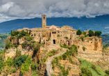 Civita di Bagnoregio, grad koji umire, Civita Italija, putovanje u Civita di Bagnoregio, što vidjeti u Civita di Bagnoregio, kako doći do Civita di Bagnoregio, ulaznice Civita di Bagnoregio, povijest Civita di Bagnoregio, Valle dei Calanchi, dolina Calanchi, Lazia, Piazza San Donato, Crkva svetog Donata, Muzej geologije i klizišta, palača Alemanni, špilja svetog Bonaventure, špilja San Bonaventure, Belvedere, Porta Santa Maria, Porta Santa Maria Civita, Piazza San Donato Civita, Belvedere Civita di Bagnoregio, mačke Civite, most Civita di Bagnoregio, atrakcije Civita di Bagnoregio, relikvijar svetog Bonaventure, turizam u Civita di Bagnoregio, francuski relikvijar Civita, Civita di Bagnoregio, the dying city, Civita Italy, travel to Civita di Bagnoregio, what to see in Civita di Bagnoregio, how to get to Civita di Bagnoregio, Civita di Bagnoregio tickets, history of Civita di Bagnoregio, Valle dei Calanchi, Calanchi Valley, Lazia, Piazza San Donato, Church of San Donato, Museum of Geology and Landslides, Alemanni Palace, Grotto of St. Bonaventure, Grotto of San Bonaventure, Belvedere, Porta Santa Maria, Porta Santa Maria Civita, Piazza San Donato Civita, Belvedere Civita di Bagnoregio, Civita cats, Civita di Bagnoregio bridge, Civita di Bagnoregio attractions, Saint Bonaventure reliquary, Civita di Bagnoregio tourism, Civita French reliquary,